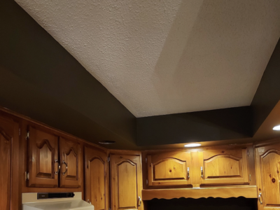 Removed wallpaper/borders. Primed and painted the walls/ceilings - After