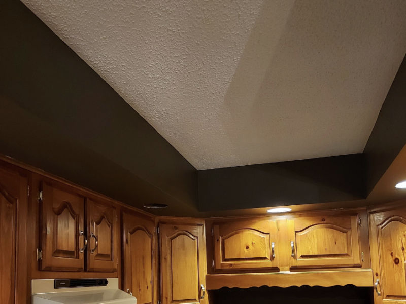 Removed wallpaper/borders. Primed and painted the walls/ceilings - After