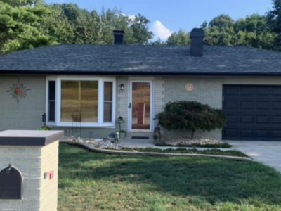 Exterior primed and painted - After