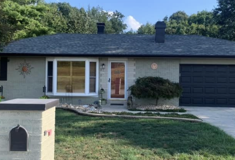 Exterior primed and painted - After