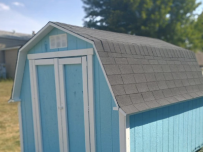 Minor repairs, pressured wash the shed and then primed and painted the exterior